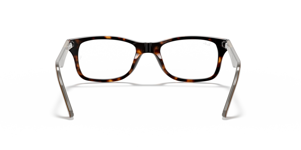 Prescription eyewear frames, tortoise pattern front with clear lenses, straight-on view.