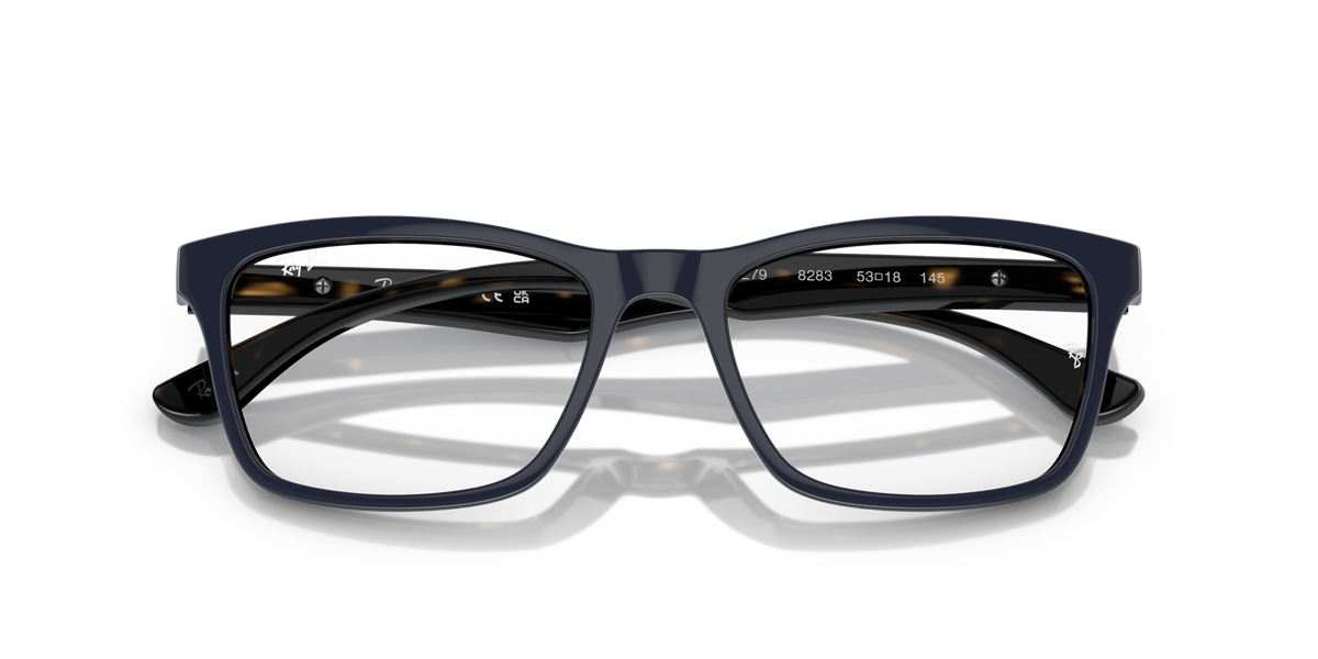 Prescription eyewear frames, dark with blue-tinted front and temple detailing