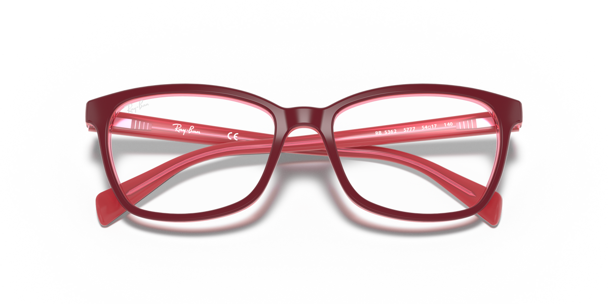 Red prescription eyeglass frames with rectangular lenses and bold frame arms