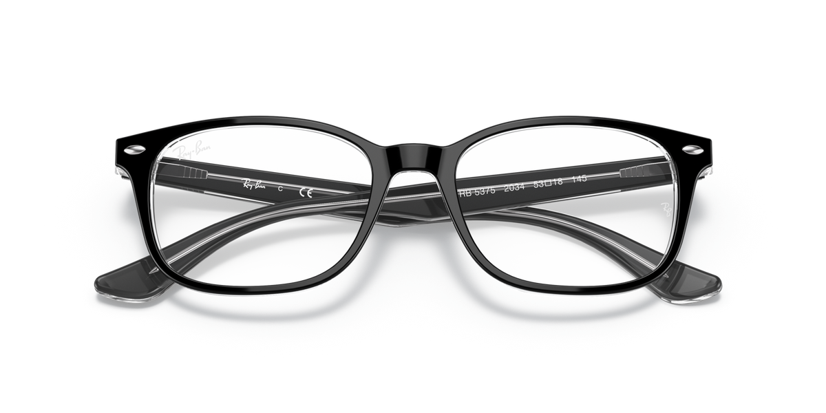 Black prescription eyewear frames with rectangular lenses and slight top branding