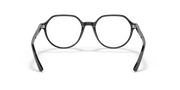 Black prescription eyewear frames with round lenses and curved nose bridge