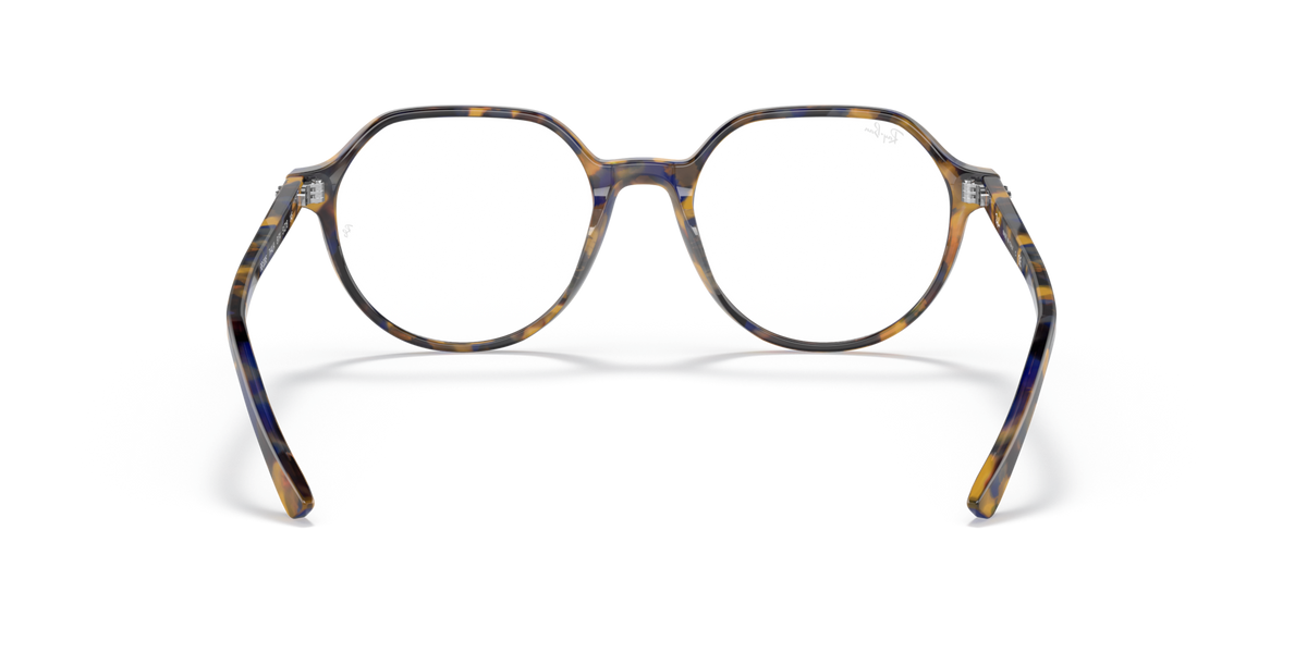 Havana striped round eyeglass frames with full rim, curved bridge, and metal temples