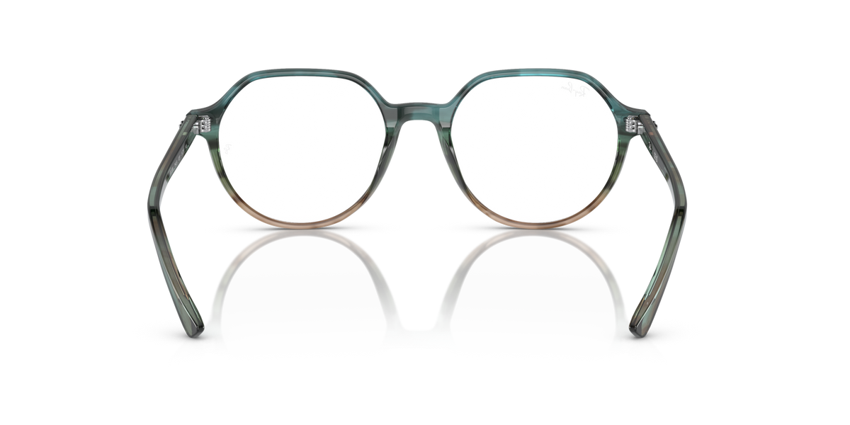 Teal round full-rim eyeglass frames with metal temples for prescription lenses