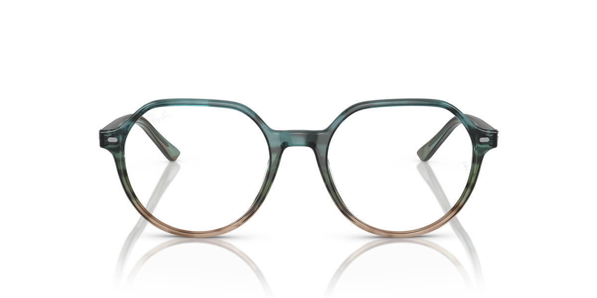 Teal round eyeglass frames with full rim, curved bridge, and prescription-ready design