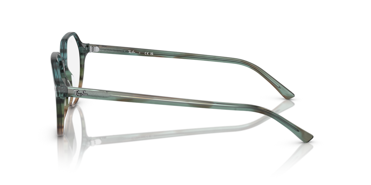 Teal round eyeglass frames, side profile with slim metal temples and nose pads
