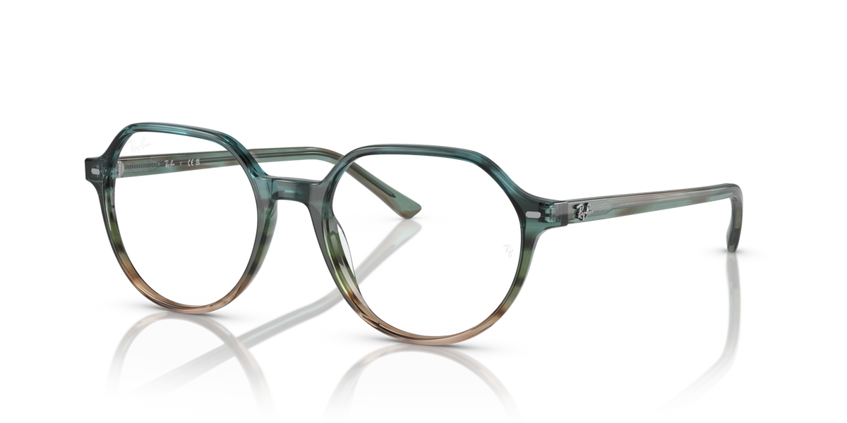Teal round eyeglass frames with full rim and metal arms for prescription lenses