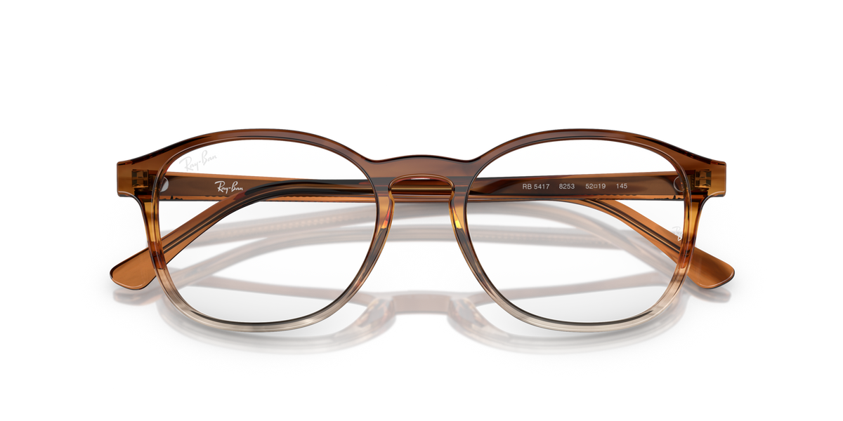 Brown translucent striped prescription eyeglass frames with clear lens rims