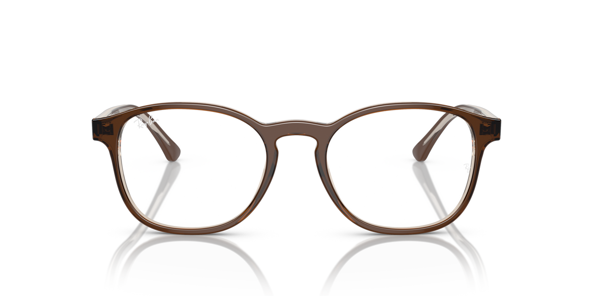 Prescription eyewear frames, brown rectangular with white lenses and dark arms