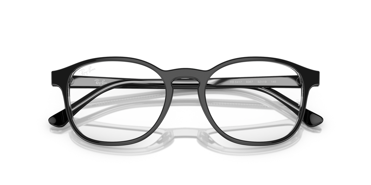 Prescription eyeglass frames, dark gray, top-down view with curved bridge area
