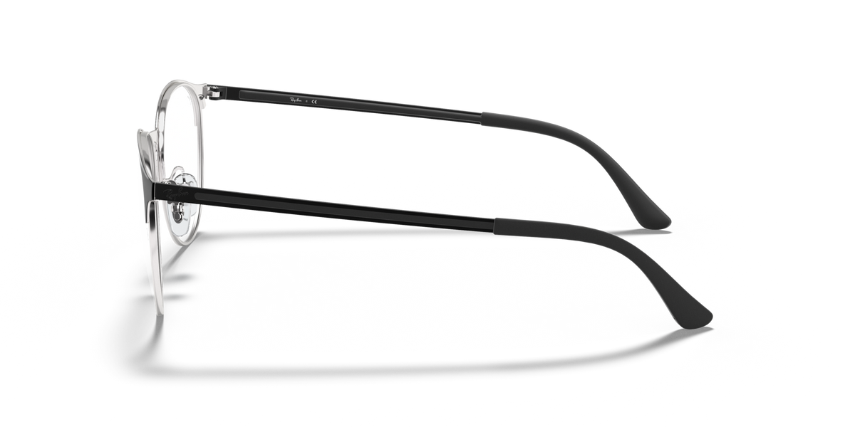 Metal prescription eyewear frames, side view with silver-toned temples and round lens rim