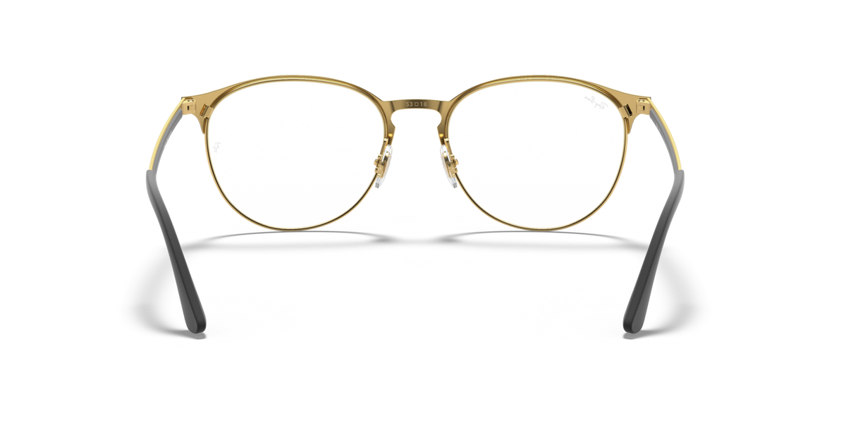 Metal prescription eyewear frames, front view with light gold frame and round lenses