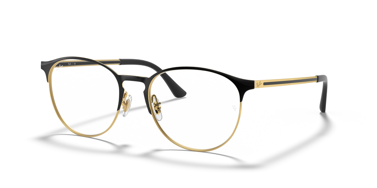 Metal prescription eyewear frames, round lenses with black frame and gold accents