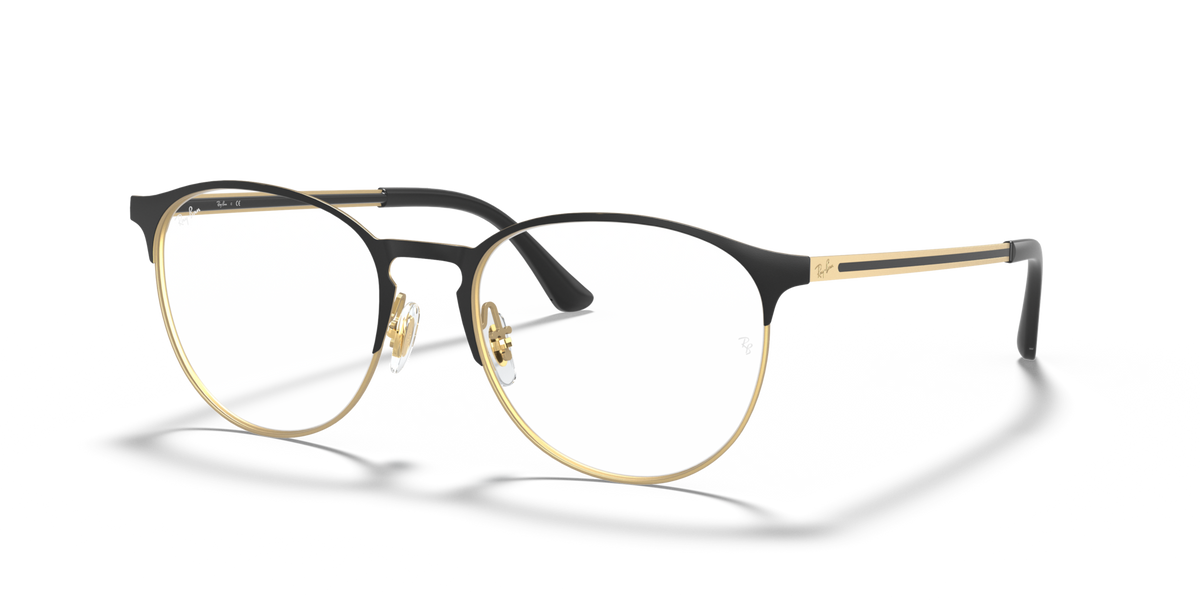 Gold-tone round eyeglass frames with dark bridge and slim metal arms