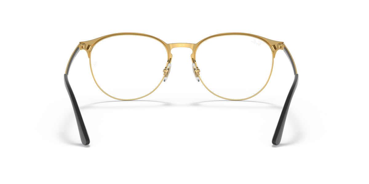 Gold-tone round prescription glasses with black temple accents and nose pads