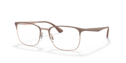 Prescription eyewear frames in beige with copper-toned metal temples, angled view