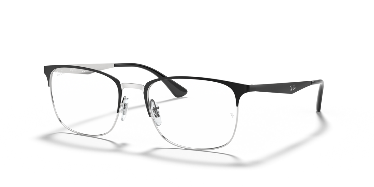 Prescription eyewear frames in dark metal with silver temples, angled front view