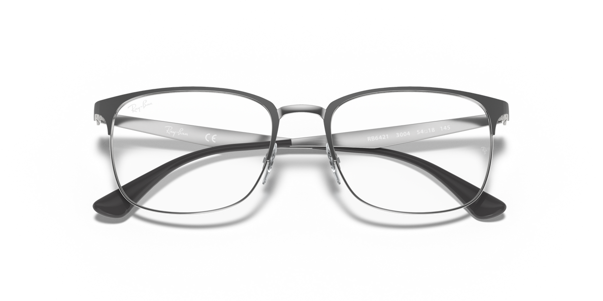 Prescription eyewear frames with clear lenses and dark metal rims, front close view