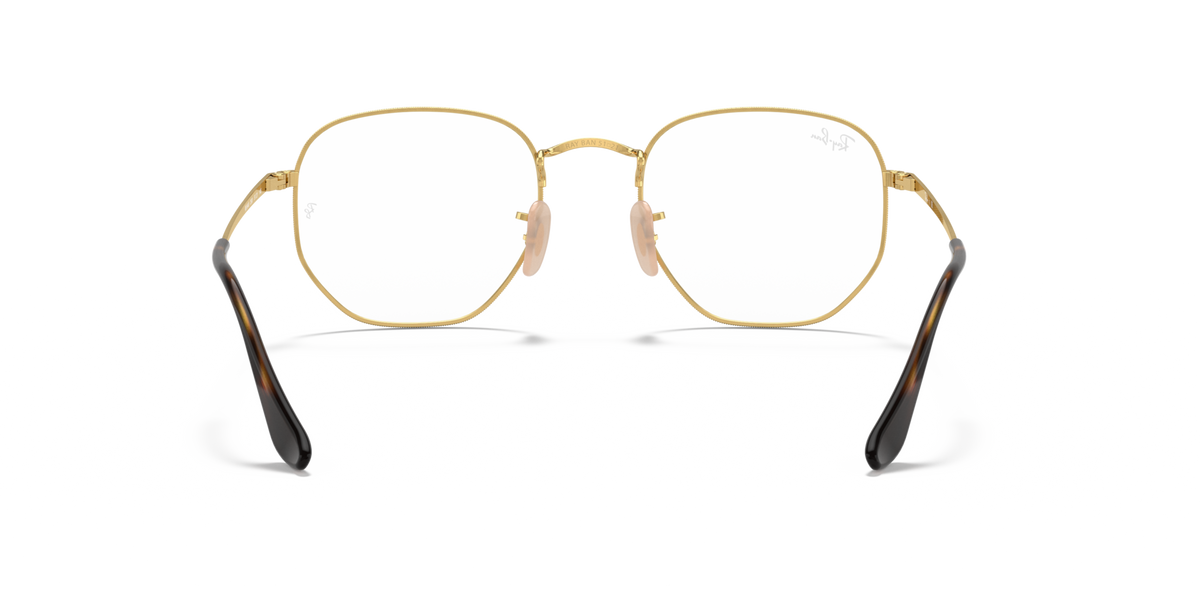 Gold-tone hexagonal prescription eyeglass frames with black temples, front view