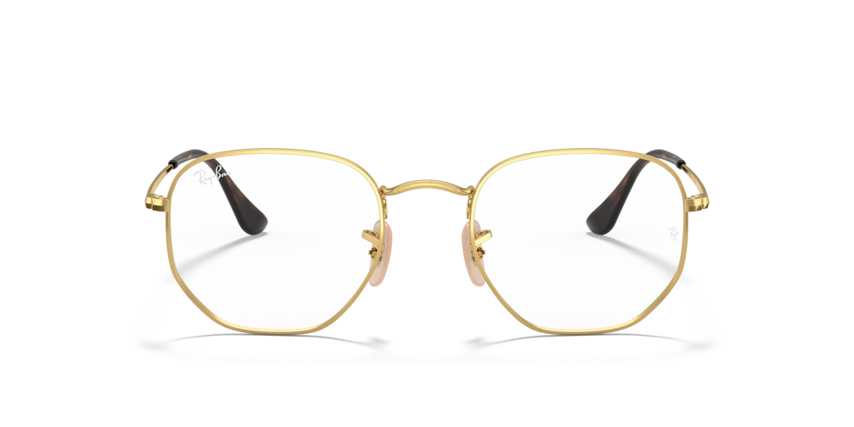 Gold-tone hexagonal prescription eyewear frames with black temple tips, front view angle
