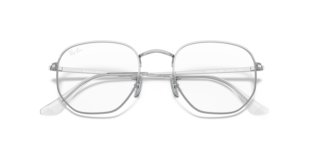 Silver round-hex prescription eyewear frames with clear lenses and nose bridge