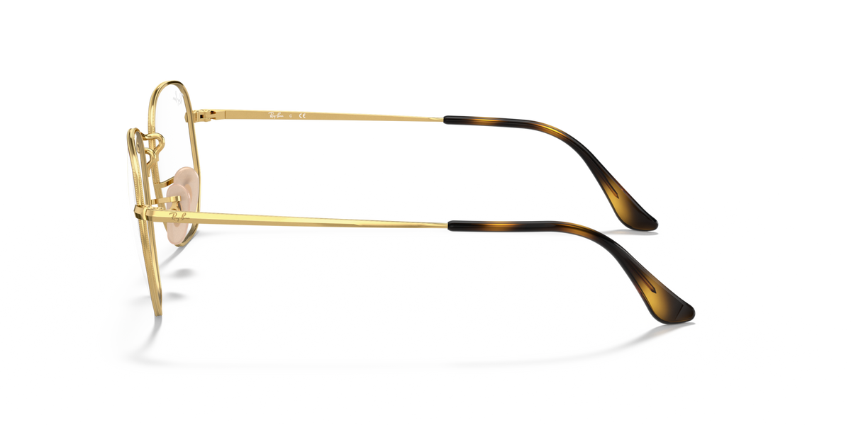 Hexagonal prescription eyewear frames, gold side profile with metal arms