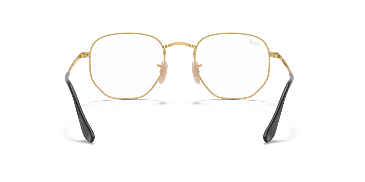 Gold-tone hexagonal prescription eyeglass frames with black temple ends, front view