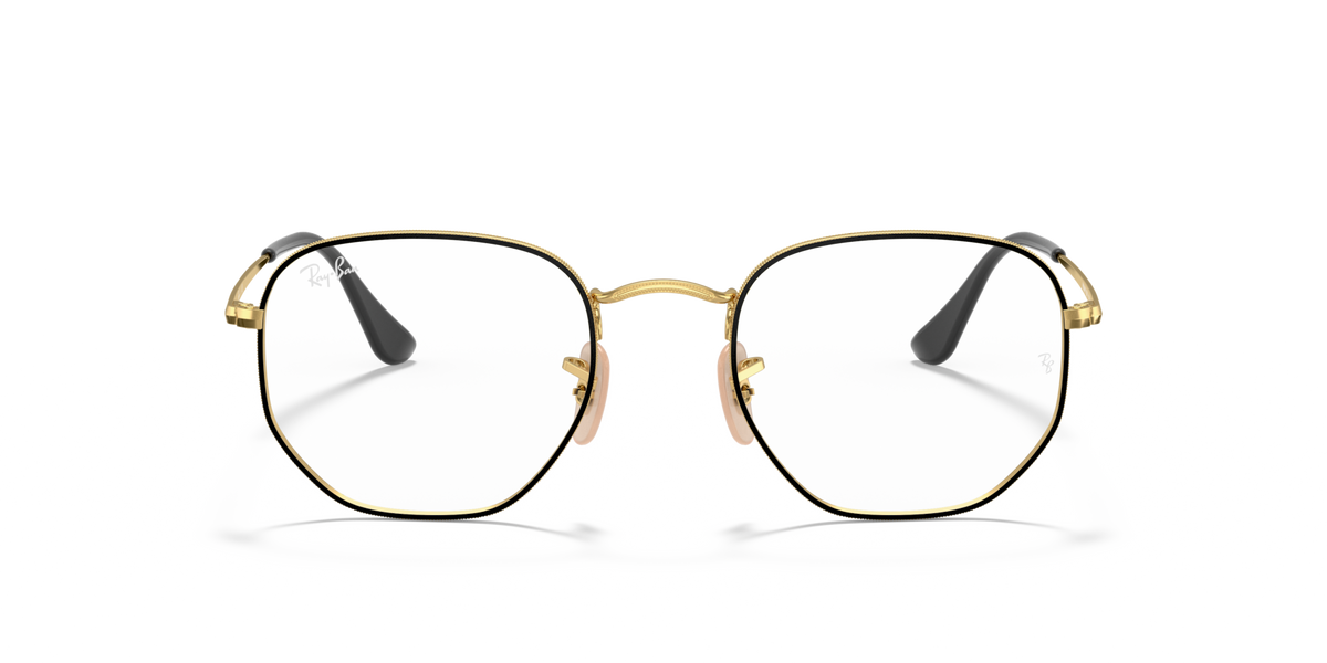 Gold-tone hexagonal prescription eyewear frames with black temples, front view angle