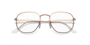Rose gold hexagonal eyeglass frames with clear lenses and slim bridge