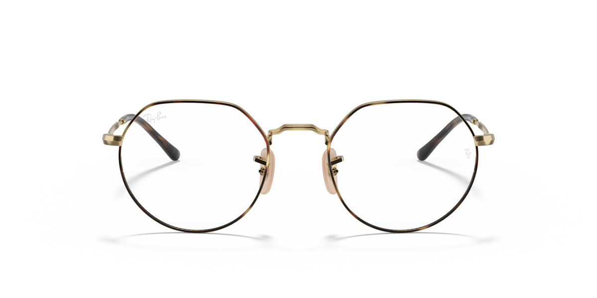 Round eyeglass frames with gold tone front and dark accent nose bridge.
