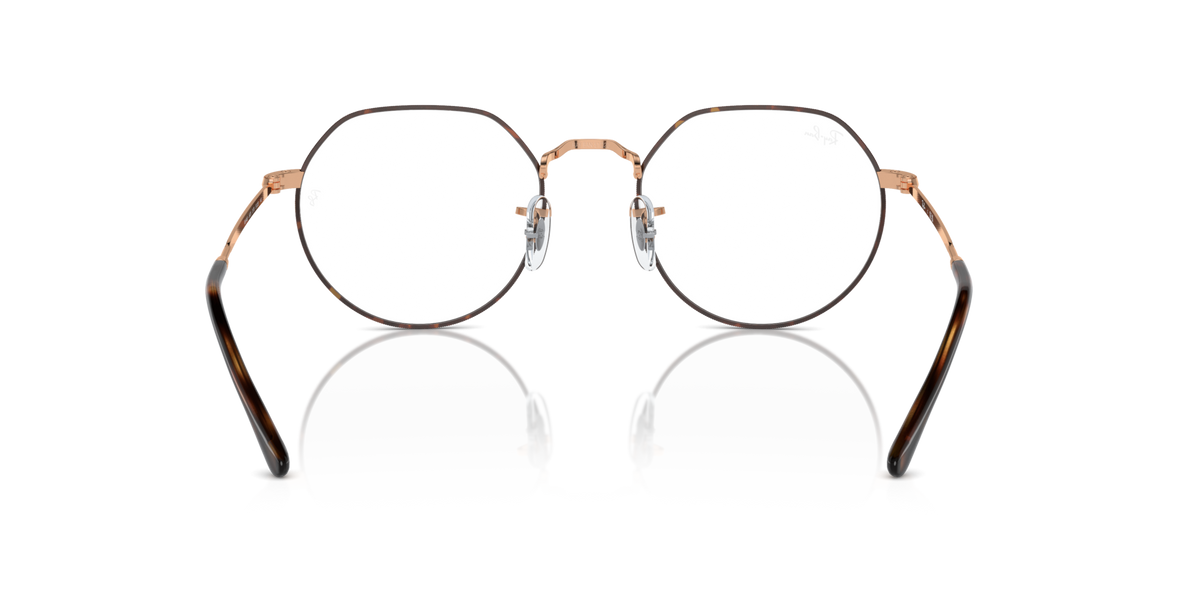Front view of round eyeglass frames with rose-gold tone metal and dark accents.
