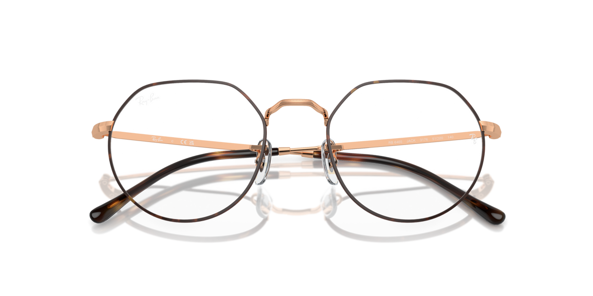 Prescription eyeglass frames, round lenses with rose-gold metal and dark temple tips