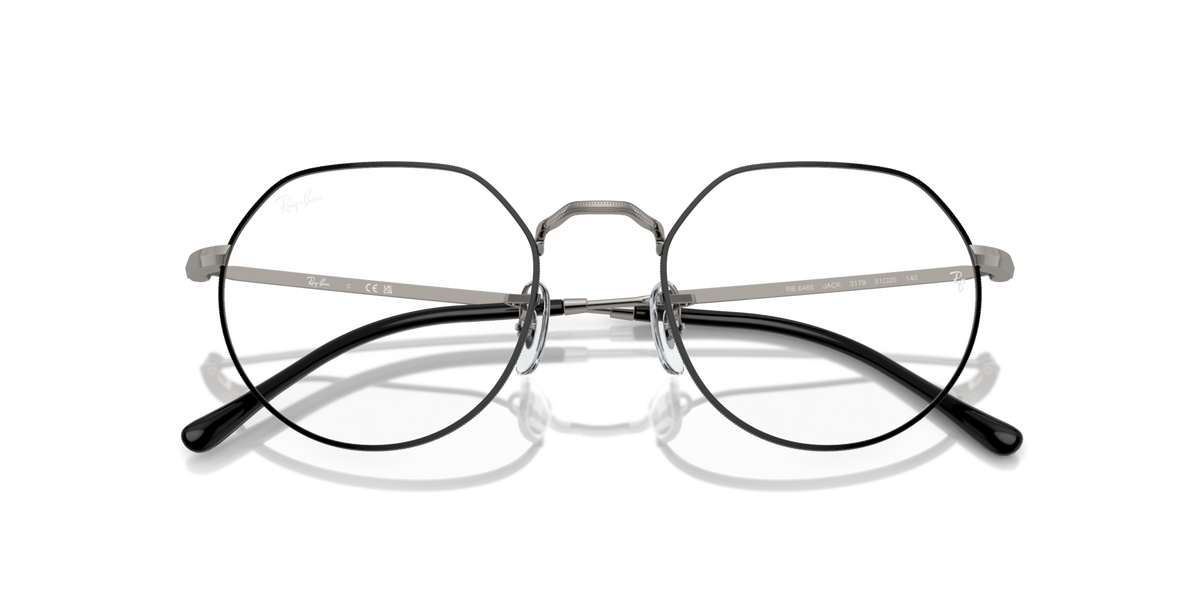Prescription eyeglass frames, round lenses with rose-gold bridge and black temple tips