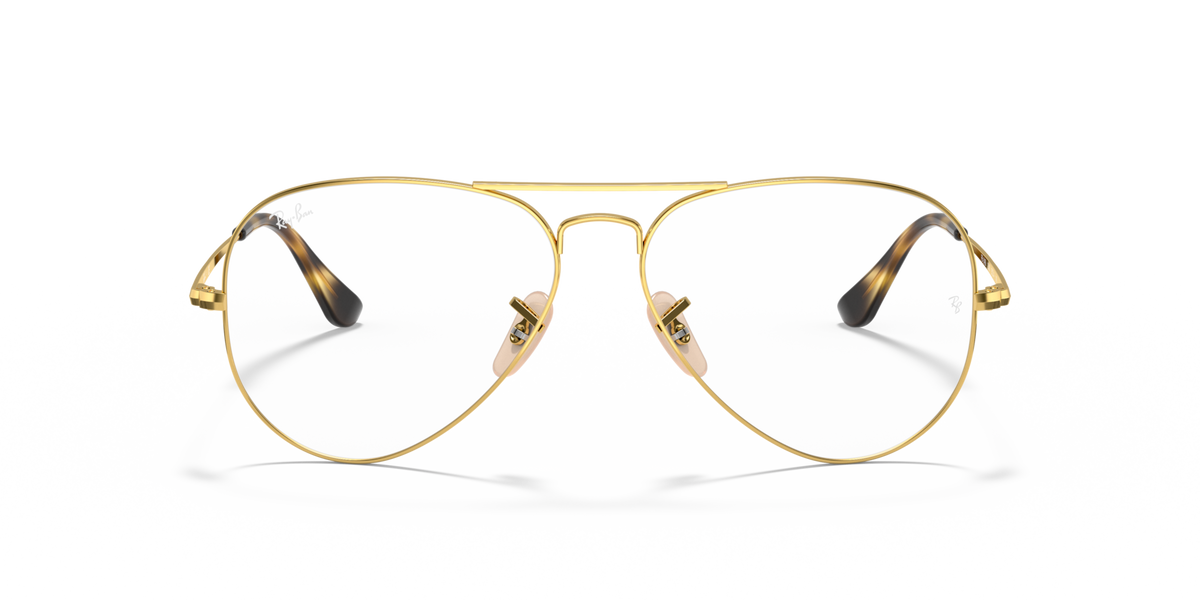 Gold aviator prescription eyewear frames with clear lenses and dark brow accents