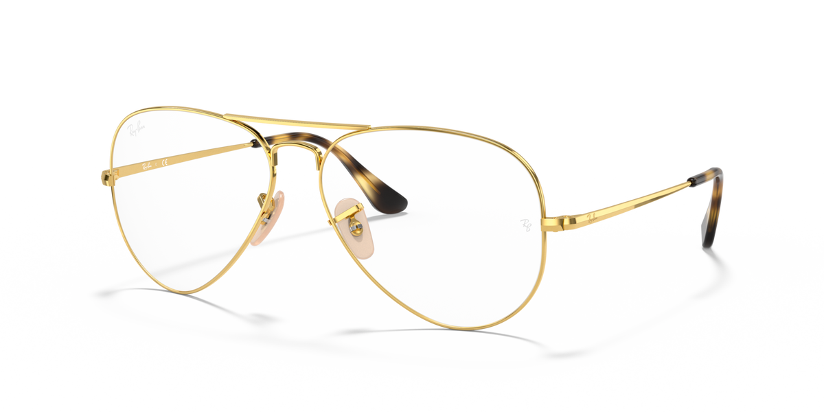 Gold aviator prescription eyewear frames with clear lenses and dark temple tips