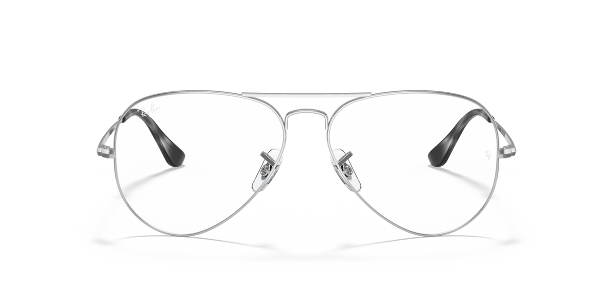Silver aviator prescription eyewear frames with clear lenses and dark brow accents