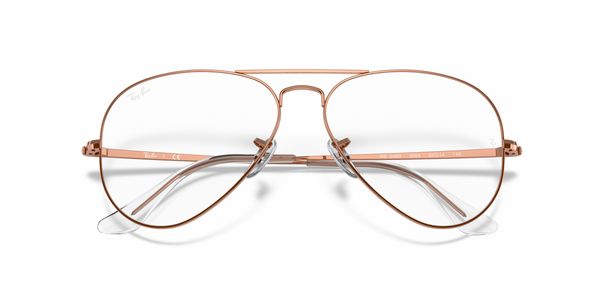 Rose gold aviator prescription eyeglass frames with thin bridge and metal temples