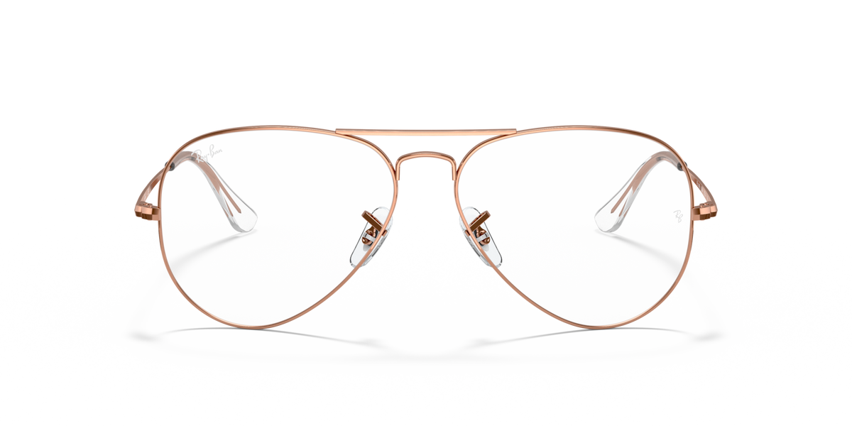 Rose gold aviator prescription eyeglass frames with clear lenses and metal temples