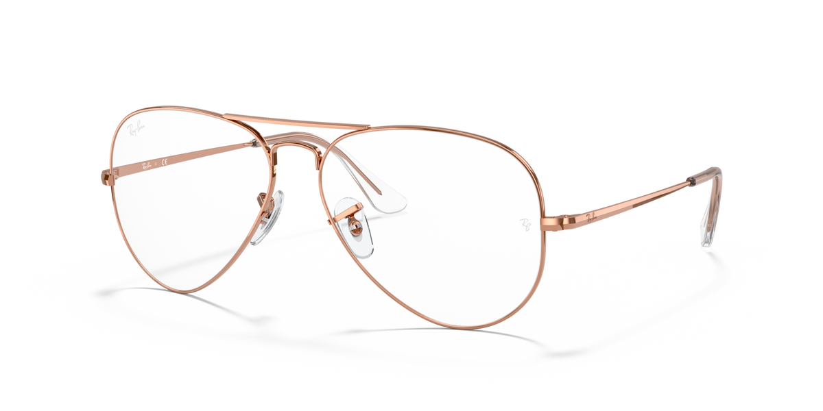 Rose gold aviator prescription eyewear frames with round lenses and metal temples