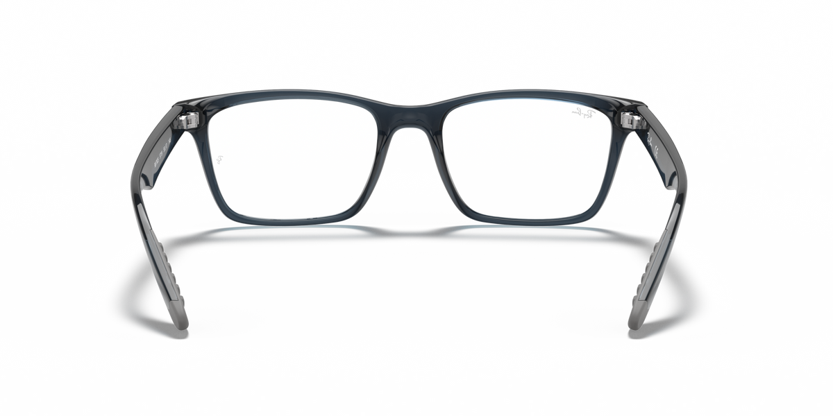 Ray-Ban prescription eyewear frames in transparent grey-blue, front view with full-rim lenses