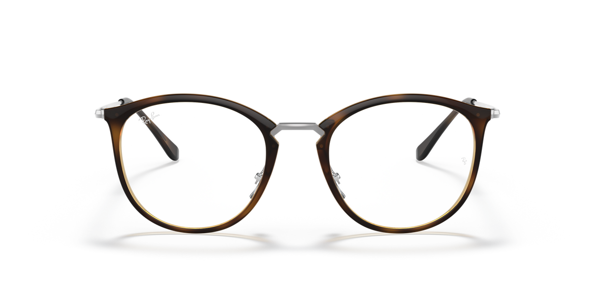 Ray-Ban prescription eyeglass frames, round havana-brown rims with clear arms and nose bridge