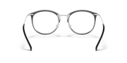Ray-Ban dark prescription eyewear frames, round lenses with arched metal bridge