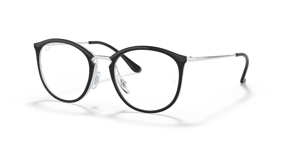Ray-Ban dark prescription eyewear frames, round lenses with thin metal temples