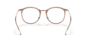 Prescription eyewear frames, transparent light brown with rose-gold metal, angled front view