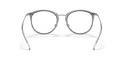 Prescription eyewear frames, transparent grey with dark metal, angled front view