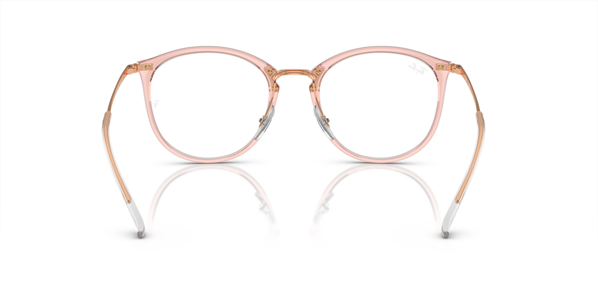 Ray-Ban RX7140 prescription frames, transparent pink round lenses, front and lower angle view