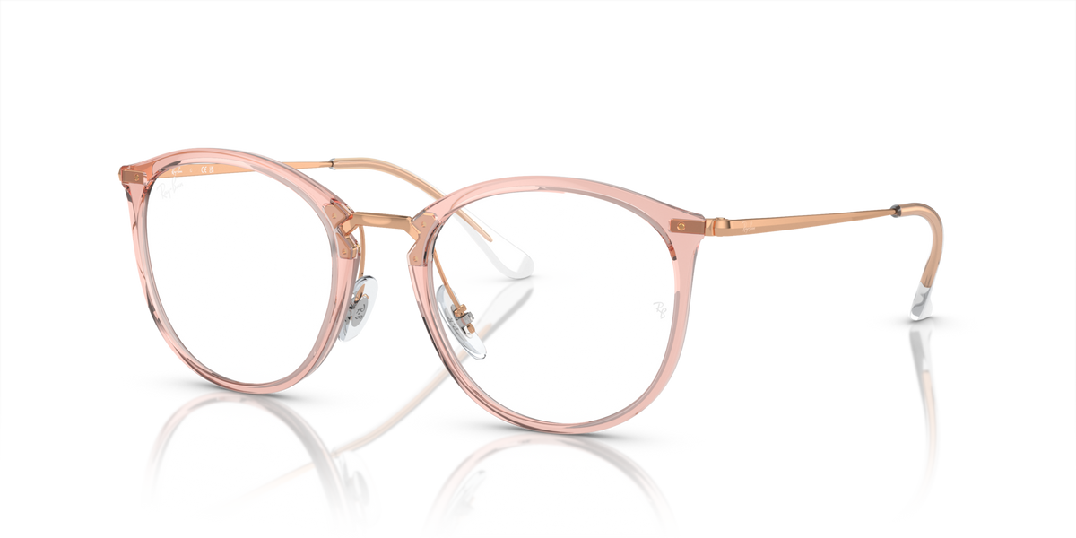 Ray-Ban RX7140 prescription frames, transparent pink with round lenses and thin gold rims