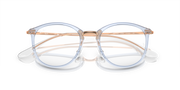 Ray-Ban RX7140 prescription frames, light blue round frames with tan accents and clear bridge