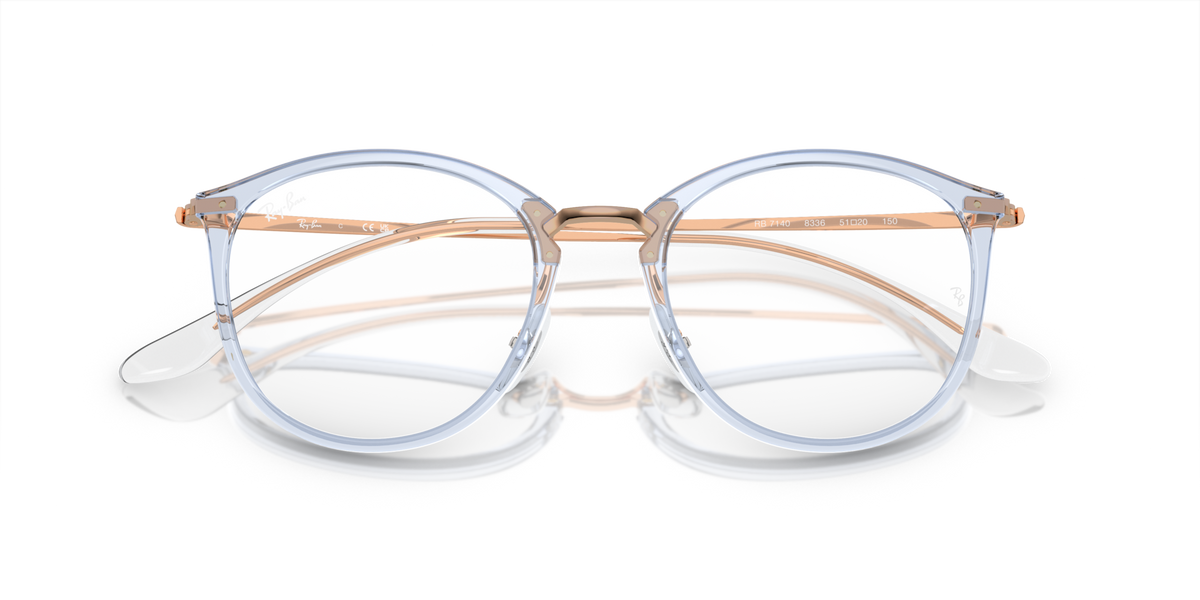 Ray-Ban RX7140 prescription frames, light blue round frames with tan accents and clear bridge