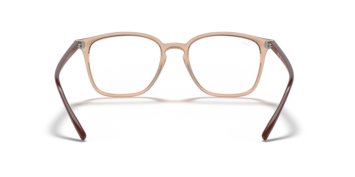 Prescription eyewear frames, light brown translucent front view with notched bridge
