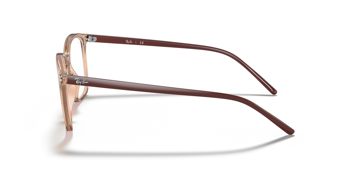 Prescription eyewear frames, light brown translucent side profile with curved temple